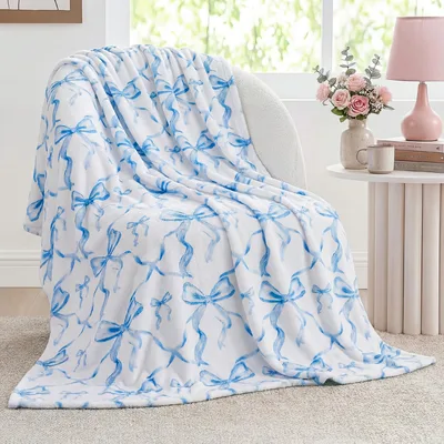 Blue Bow Blanket: Watercolor Ribbon Pattern for Cozy Rooms