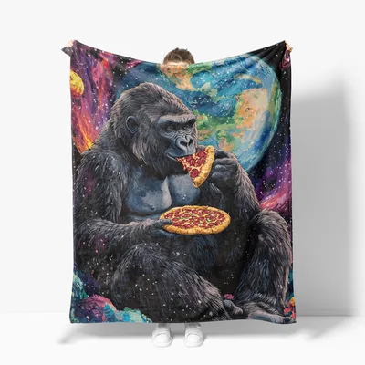 Gorilla Pizza Space Blanket features a cosmic ape enjoying