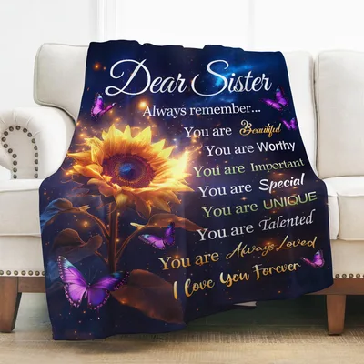 Sister Sunflower Butterfly Blanket featuring a glowing flower