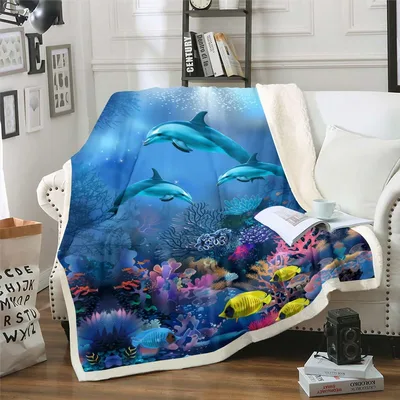 Dolphins Under the Sea Blanket features three swimming