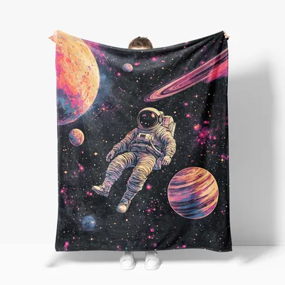 Astronaut Floating Among Planets Blanket: Cosmic Adventure Design