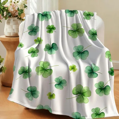 Clover Dance on White Blanket featuring a watercolor shamrock pattern
