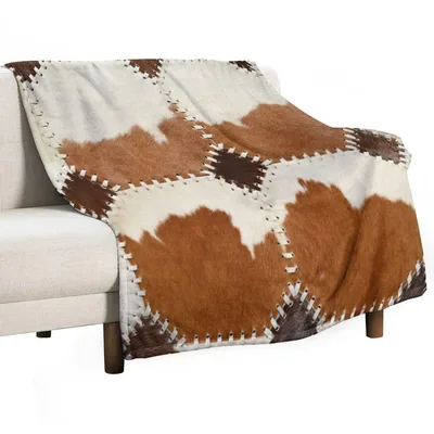 Patchwork Cowhide Print Blanket featuring rustic brown